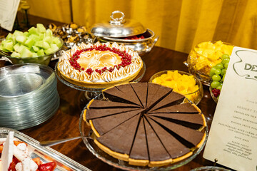Chocolate Tart and Lemon Meringue Pie on Dessert Table