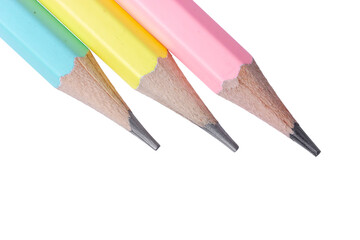 Three pastel colored pencils isolated on a white background