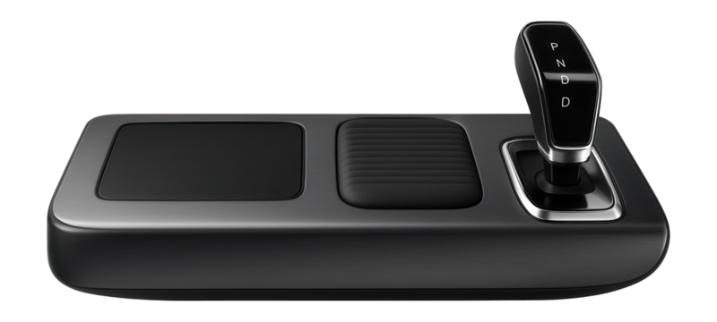 Slim central console featuring a digital gear selector and wireless charging pad