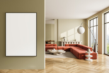 Modern interior with blank poster mockup on olive wall and stylish red sofa in sunlit living room...