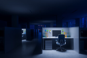 Office cubicle with glowing workstation in dark corporate interior at night, concept of overtime or...