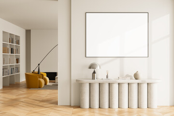Modern interior with blank framed poster mockup on white wall above artistic console table in...