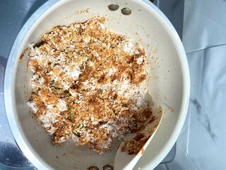 Cooking ingredients in a pan, closeup food preparation