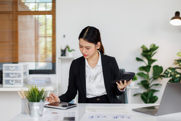 Business finance accounting banking concept. Business woman hand doing finances and calculate on...