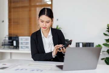 Business finance accounting banking concept. Business woman hand doing finances and calculate on...