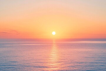 Peach-Colored Sky with Sun Setting Over the Ocean