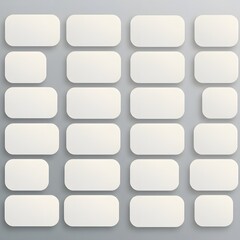 Rows and columns of rounded rectangle shapes in a grid pattern on a gray background.