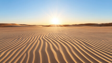 Naklejka premium Endless sand plain with rippling patterns under bright sun, creating serene atmosphere