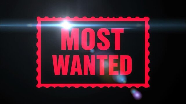 Red "Most Wanted" sign on black background with lens flares