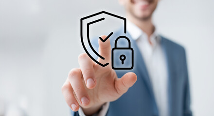 Businessman touching lock and shield icon representing cyber security and data protection concept