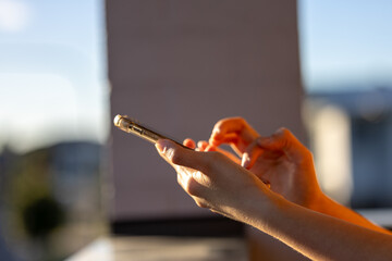 woman using smart phone. The concept of living on vacation and playing social media. Social Distancing ,Working From Home