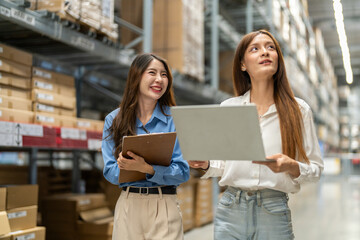 Asian warehouse staff teamwork, supply chain logistics management, shipping inventory check with laptop and clipboard, modern e-commerce b2b fulfillment, smart warehouse system wms operation, industry