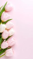 Obraz premium Soft Pink and White Tulips on a Pastel Pink Background