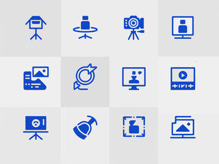 Collection of blue digital media and broadcasting icons including camera monitor presentation and video player symbols presented in a clean silhouette style