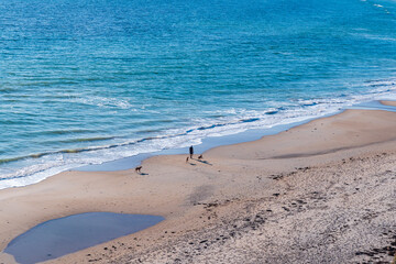 Maslin Beach offers a rare moment of winter sunshine, drawing visitors to its golden sands.