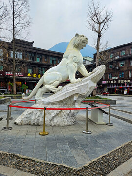 White Tiger Sculpture is the totem of Tujia people. The tiger sculpture is made of white marble, it is 3.8 meters high and 3.6 meters long.  It is located in Hunan Province, China. (February 24, 2025)