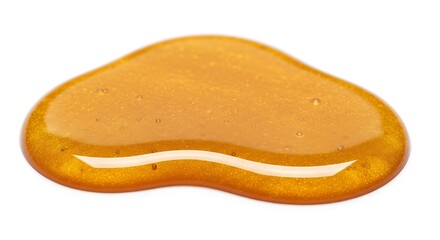 Golden honey drop isolated on white background