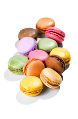 Colorful macaroons assortment featuring vibrant pink, yellow, green, violet and brown French pastries creamy fillings, macarons isolated on white background, gourmet dessert, vertical