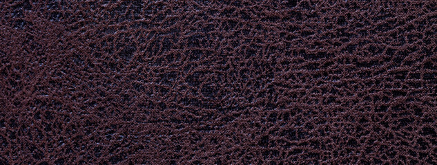 Dark burgundy textile fabric background with velvet structure and textured pattern. Brown cloth...