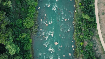 Gliding over the winding Animas River as it cuts through Durango. Crystal-clear water, rocky banks, and endless views.