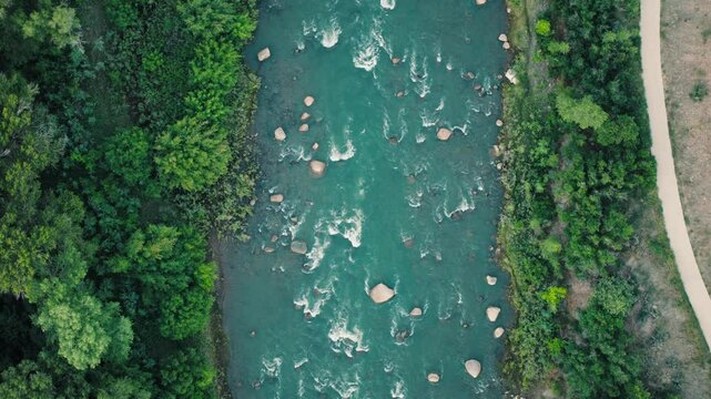 Gliding over the winding Animas River as it cuts through Durango. Crystal-clear water, rocky banks, and endless views.