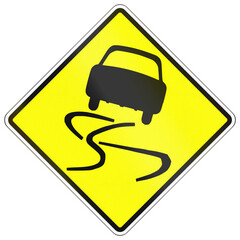 Warning road sign in Cambodia - Slippery road