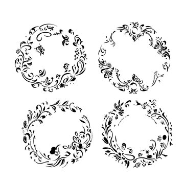 A black and white outline of a blooming flower with detailed petals and leaves. 