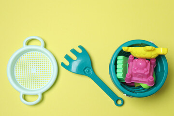 Children's toys on a yellow background