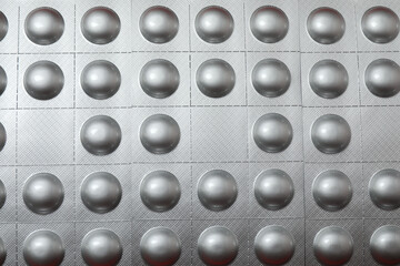 silver metal spheres on a silver background