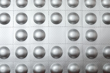 silver metal spheres on a silver background