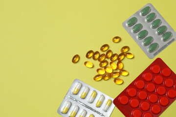 Tablets scattered on a yellow background
