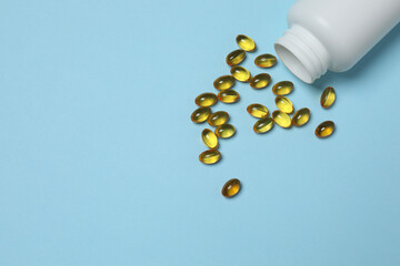 loose tablets on a blue background