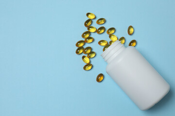 loose tablets on a blue background