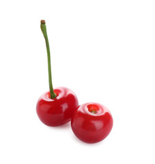 Two fresh ripe cherries isolated on white