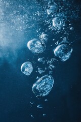 Underwater bubbles and water splashes, blue background