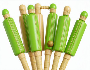 A collection of green and tan handcrafted bowling pins reminiscent of a whimsical game under soft