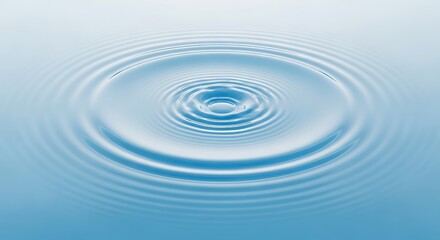 Ripples expanding outwards on a calm water surface, creating a circular pattern.