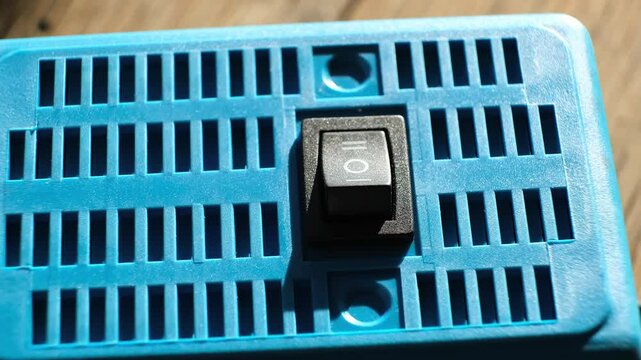 Finger pushes on KCD1-101 6c Rocker Switch electrical component rocker-style actuator for on off on control. Offers as a simple reliable switching mechanism, with a durable. High quality 4k footage.