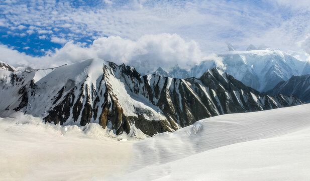 Snow-capped K2 and other peaks above 8000 meters - Powered by Adobe
