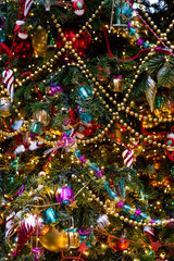 Beautiful Christmas background. Beautiful holiday toys on the New Year's tree in Moscow. Concept of preparation and decoration for the new year 2026.