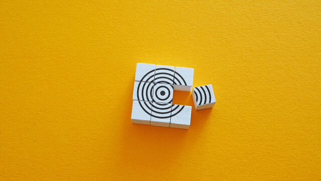Puzzle forming a target symbolizing strategic focus and goal achievement.