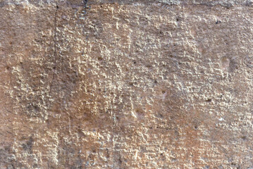 Light texture of a wall. Grainy and rough. Background for projects.