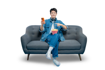 PNG,A smiling young man points at his popcorn while holding a phone, perfect for food delivery app or movie snack concepts.