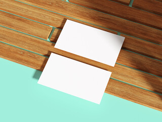 White business card above wooden boards.