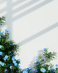 Elegant arrangement of white flowers with green leaves on a smooth white wall backdrop.