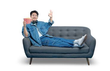 PNG,A man relaxing on a sofa with popcorn gives an "OK" sign, indicating he's enjoying a perfect movie or show.
