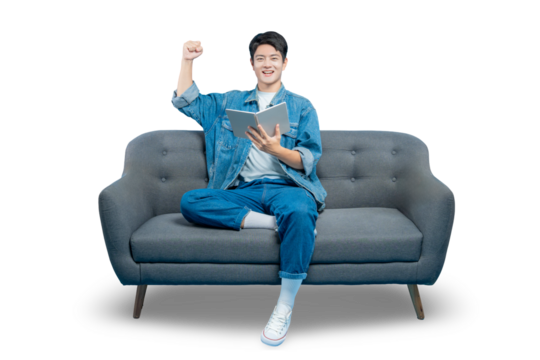 A successful student celebrates with a fist pump while holding a book, happy about passing an exam or understanding a topic.PNG