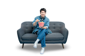 A friendly young man offers popcorn to the viewer while sitting on a sofa, ready for a shared movie...