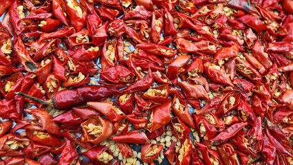 Close-Up of Sliced Red Chili Peppers Drying in the Sun