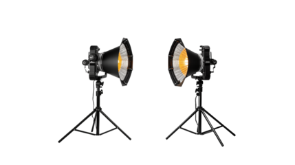 Two professional studio lights illuminate isolated on transparent background, ready for photography or videography setup.